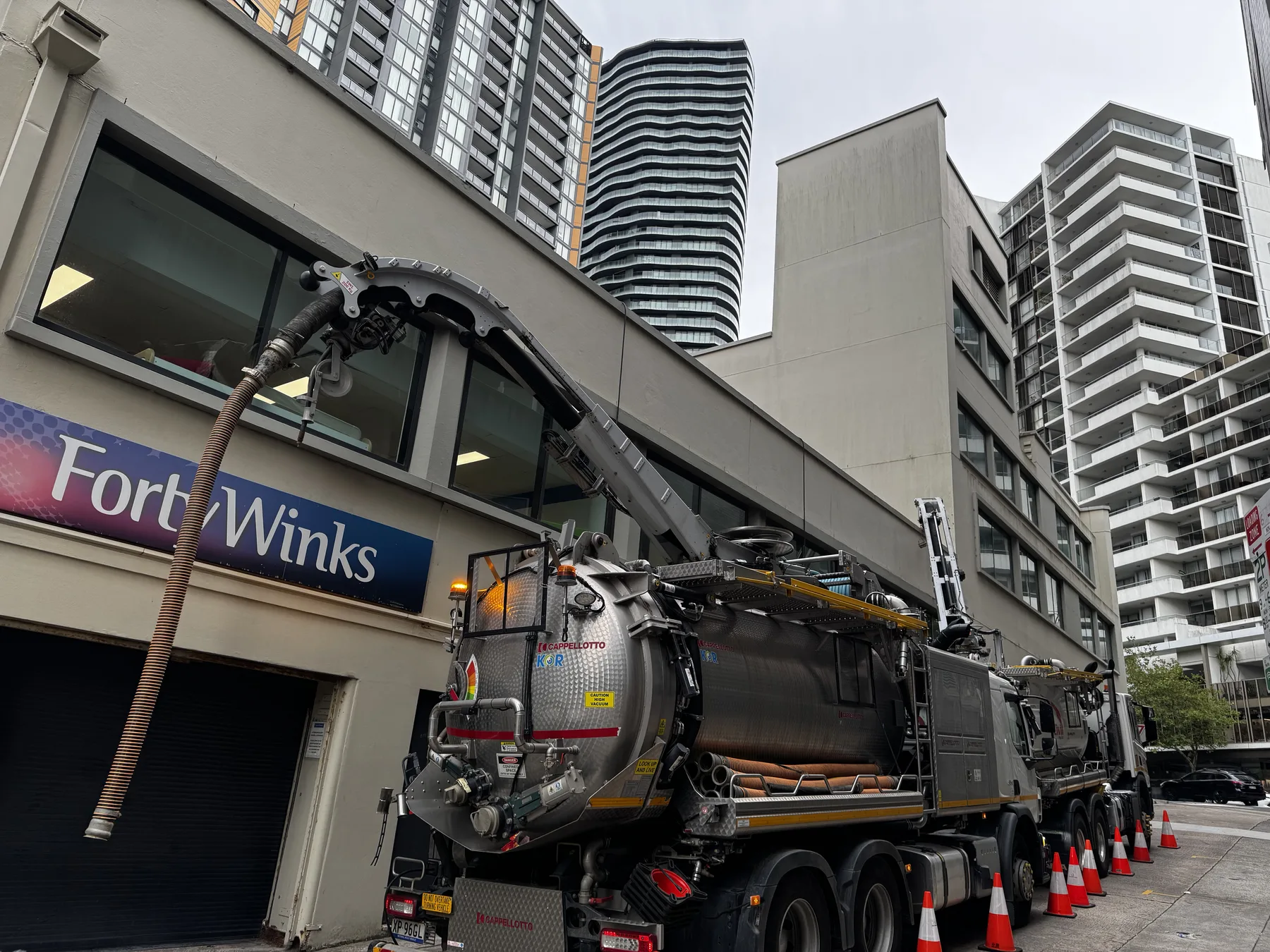 Eire Vacuum Services truck positioned for hose access on a Sydney job